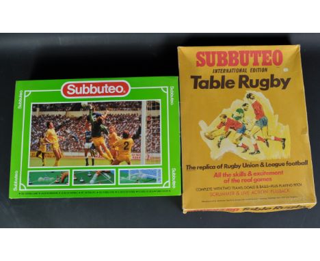 Two original vintage Subbuteo table top Football and Rugby team sets. The sets appearing complete with all teams present, pit