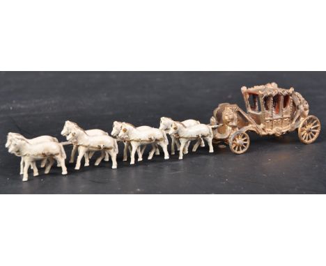 A vintage believed Moko Lesney miniature diecast Coronation Coach and Horses. Gold painted coach with x8 white horses and a f