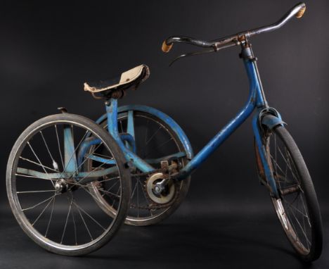 A vintage believed Triang / Tri-ang children's three wheel tricycle / trike. Blue paintwork with chrome handle bars and white