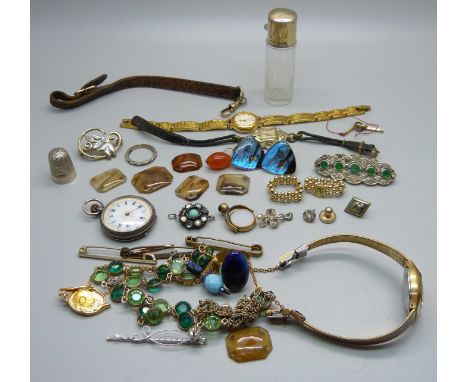 A silver topped glass bottle, a silver fob watch, jewellery, etc. 