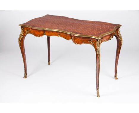 A bureau-platRosewood veneerRosewood, jacaranda and other timbers marquetry decorationFoliage motifs gilt bronze mountsFrance