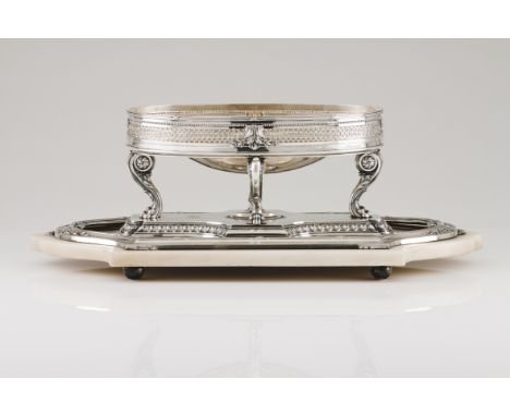 A Belle Époque plateau with presentoirGerman silverOval bowl on 4 volute feet of floral finials and zoomorphic feet, on a sca
