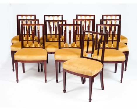 A set of six neoclassical chairsMahoganyPierced backs of carved and gilt decorationUpholstered seats and arrow feetPortugal, 