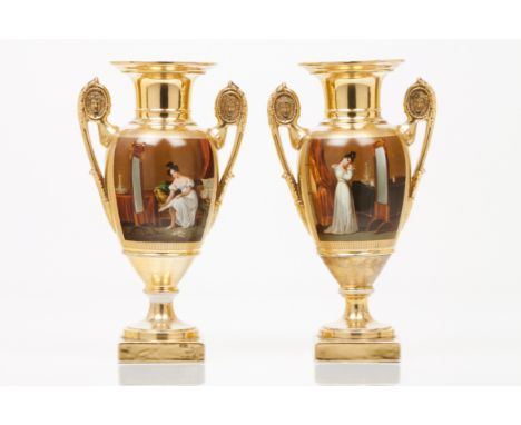 A pair of Empire vasesFrench porcelainGilt and painted decoration depicting domestic scenes with female figuresMoulded handle