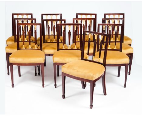 A set of six neoclassical chairsMahoganyPierced backs of carved and gilt decorationUpholstered seats and arrow feetPortugal, 