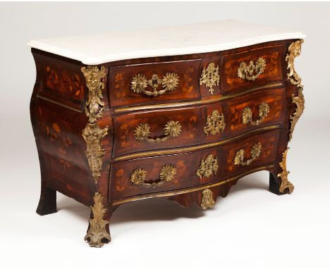A Louis XV commodeSolid rosewood and rosewood veneered with floral boxwood and other timbers marquetry decorationGilt bronze 