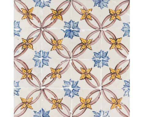 A tile panelYellow , blue and manganese "carpet pattern" decoration 16 tilesPortugal, 18th century14x14 cm (cada azulejo)