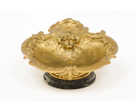 An Art Nouveau ring standChiselled bronze depicting a boy's headMarked F.BarbedienneMarble standFrance, 19th century5,5x15x15