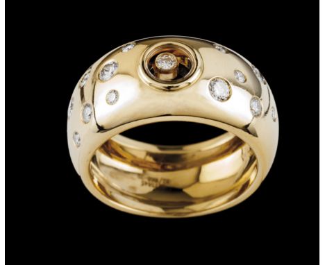 A Chopard ringGold"Happy Diamonds" collection set with 12 small brilliant cut diamonds and one central loose diamondDeer hall