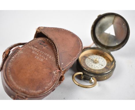 A WWI Period Leather Cased Brass Prismatic Compass by S Mordan and Co, Stamped with Crow's foot and 1918 