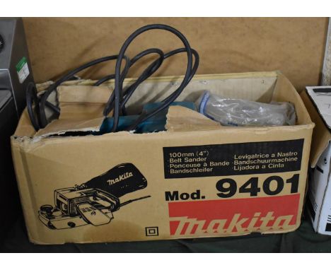 A Makita Belt Sander (Unchecked but with Box) 