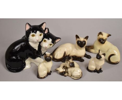 A Collection of Various Ceramic Cat Ornaments to comprise Examples by Beswick and Royal Doulton Etc 