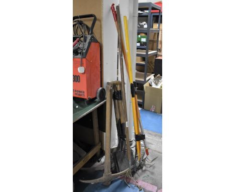 A Collection of Various Garden Tools to include Spade, Pick Axe, Rake Etc 