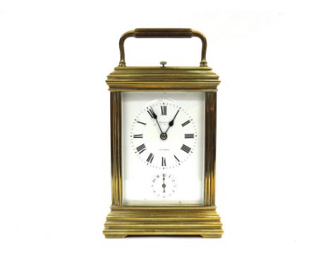 An F Clading, Bighton brass carriage clock, Roman numerals, with alarm with key, 14cm tall