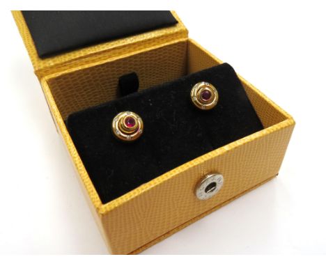 A pair of 18ct gold ruby and diamond earrings, can be worn as just ruby studs or with the diamond halo, 6g