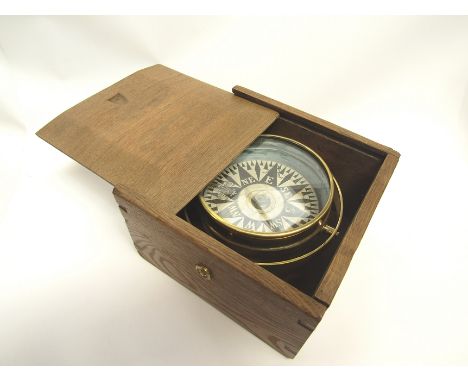 A 20th Century brass cased gimballed compass in case