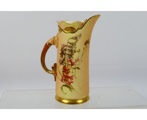 A late Victorian Royal Worcester blush ivory and gilt jug, shape 1229, decorated with floral sprays and having lotus moulded 