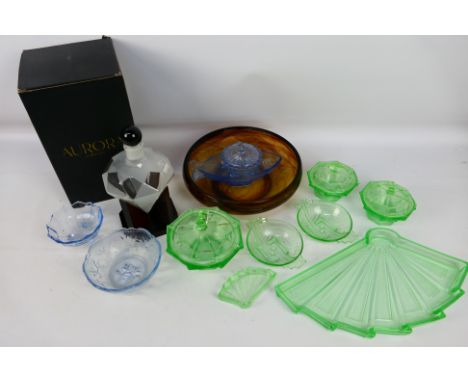 An Art Deco style green glass dressing table set, a boxed Aurora Collection decanter and stand and other. [W]