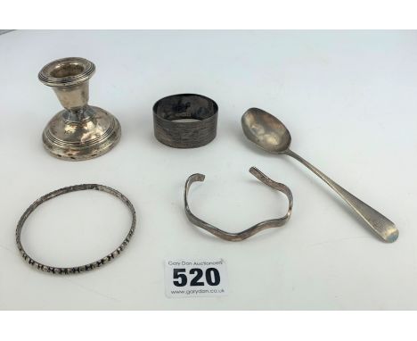 Assorted silver items inc. Candlestick (weighted base), napkin ring, spoon and 2 bangle bracelets, total w: 4.5 ozt