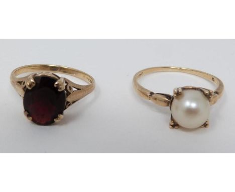 Two 9ct yellow gold dress rings. One set with a garnet with an approximate weight of 2.57 carats, the other set with round cu