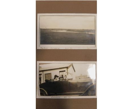 A vintage 1930's photo album containing black and white photos of the Basra War memorial in Iraq before it was moved to a dif