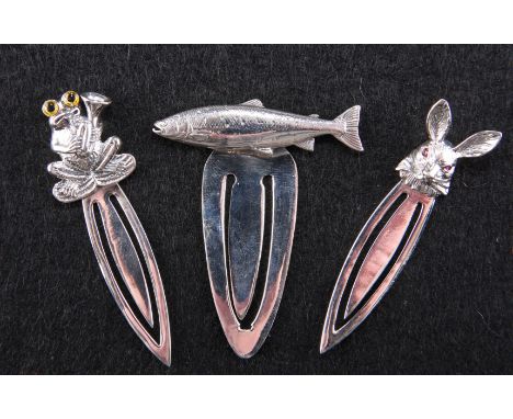 A GROUP OF THREE SILVER NOVELTY BOOKMARKS, the first with fish form finial, the second as a musical frog, and the third a har