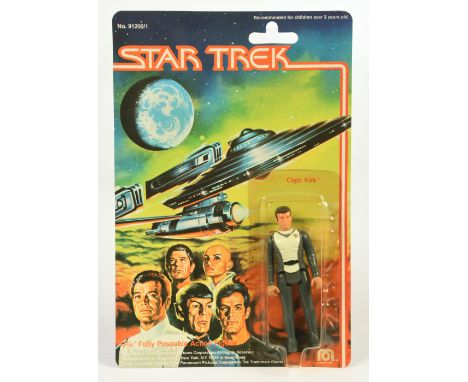 Mego Corp Star Trek Kirk 3 3/4" vintage figure, within Good Plus to Excellent (yellowed bubble) sealed packaging. See photo