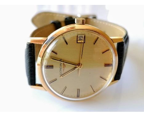 A vintage Longines manual gent's 9ct gold-cased watch with replacement strap, gilt dial 32mm, baton markers, sweeping seconds