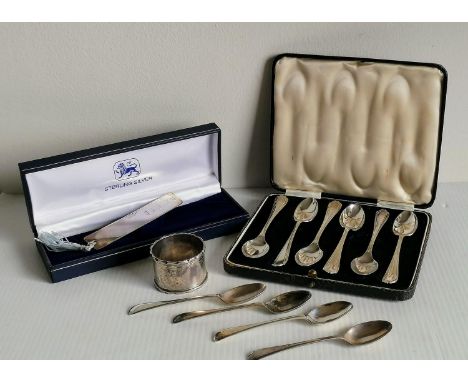 A George V cased set of six silver coffee spoons by W H Haseler Ltd., Birmingham, 1922; four others by Thomas Bradbury &amp; 