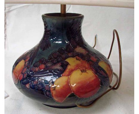 A Moorcroft pottery large table lamp, tubeline decorated in the Finches design, squat baluster form, 22cm high plus fitting 