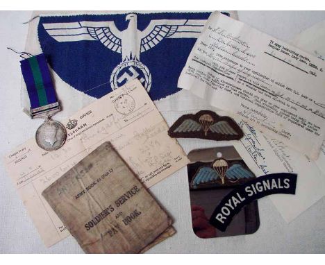 A George VI Palestine Medal 1945-48 2600614 SIGMN. J.E Anderson R.SIGS, one clasp; an Army Book 64 (part 1) Soldiers Service 