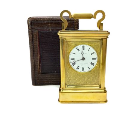 LATE 19TH CENTURY CARRIAGE CLOCK, by Hamilton &amp; Co., with two train movement, the white enamel dial with Roman numerals, 