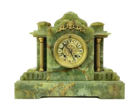 LATE VICTORIAN GILT AND ONYX MANTEL CLOCK, with two train movement, the gilded dual with white enamel Roman chapter markers, 