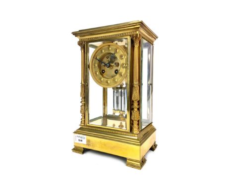 EARLY 20TH CENTURY GILTMETAL MANTEL CLOCK, with two train eight day movement, visible escapement, the pendulum with time comp