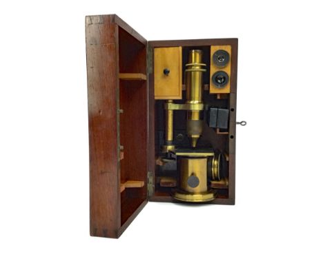 FRENCH MONOCULAR MICROSCOPE BY NACHET OF PARIS, lacqeuered brass body, 23.5cm high, in fitted case complete with two objectiv