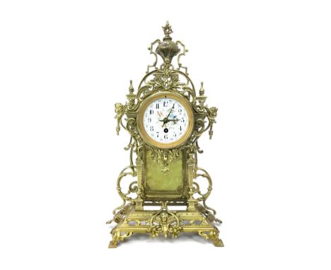 EARLY 20TH CENTURY FRENCH GILT METAL MANTEL CLOCK, with one train movement, the white enamel Arabic numeral dial painted with