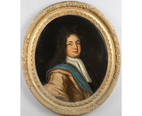 Quarter length, wearing a pale russet coat, blue sash, white neckcloth and long wig, oil on canvas, oval, gilt Lely-type fram