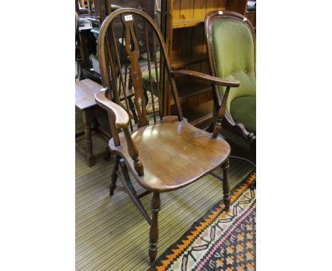 A 19th/20th century hoop &amp; stick back armchair with well figured seat, the seat stamped "W.W"