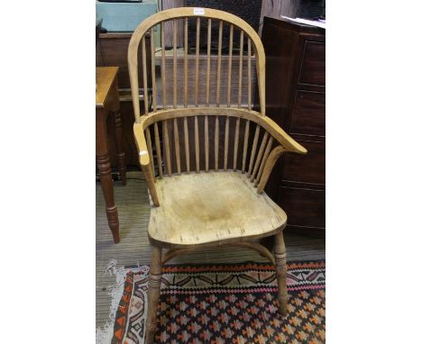 A pair of 20th century double comb back armchairs with crinoline stretcher (recently stripped!)