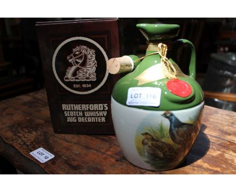 Rutherford's 12 year old whisky, in ceramic flagon, with original box