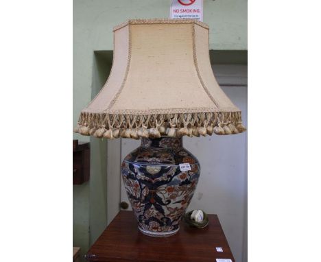 A probable 19th century Oriental vase, hand painted in the Imari palette, converted to a table lamp