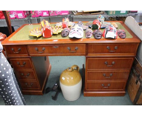 A reproduction yew wood twin pedestal computer desk