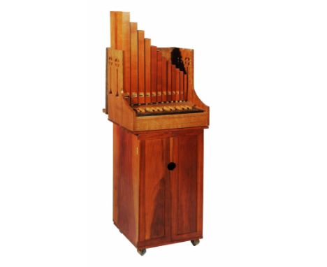 A PORTATIVE ORGAN AND STAND made by Donald Gill, the organ of traditional form with twenty five keys, inscribed with makers n