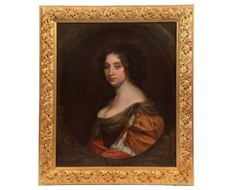 CIRCLE OF MARY BEALE (1633-1699) Portrait of a lady with shoulder length curly hair and wearing a dress décolletté within an 