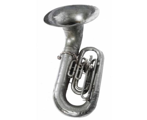 A C.G. CONN LTD ELKHEART-IND USA SOUSAPHONE TUBA in silvered brass, the 53cm bell with engraved decoration