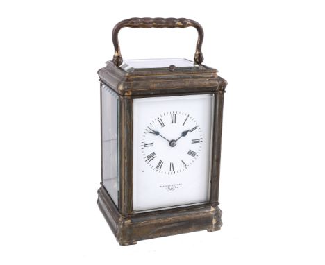 A French brass gorge cased carriage clock with push-button repeat Retailed...   A French brass  gorge   cased carriage clock 