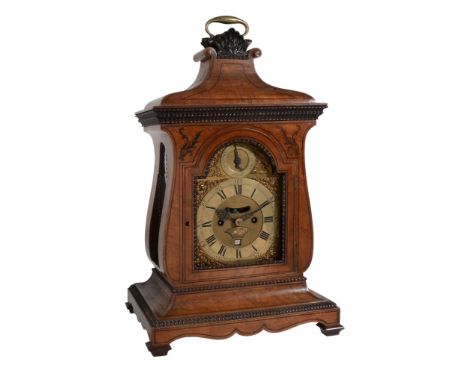 A burr birch cased table clock The movement and dial by Charles Cabrier, London   A burr birch cased table clock The movement