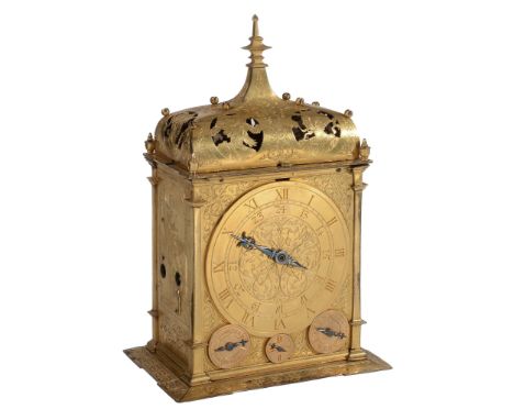 A fine German gilt brass quarter striking table clock with annual calendar...   A fine German gilt brass quarter striking tab