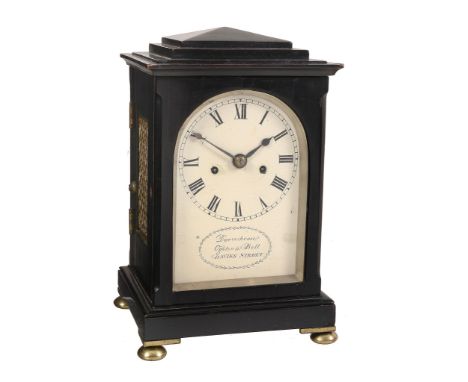 A William IV small ebonised table clock Dwerrihouse, Ogston and Bell, London   A William IV small ebonised table clock Dwerri