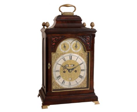 A George III mahogany table clock with pull-quarter repeat on six bells...   A George III mahogany table clock with pull-quar